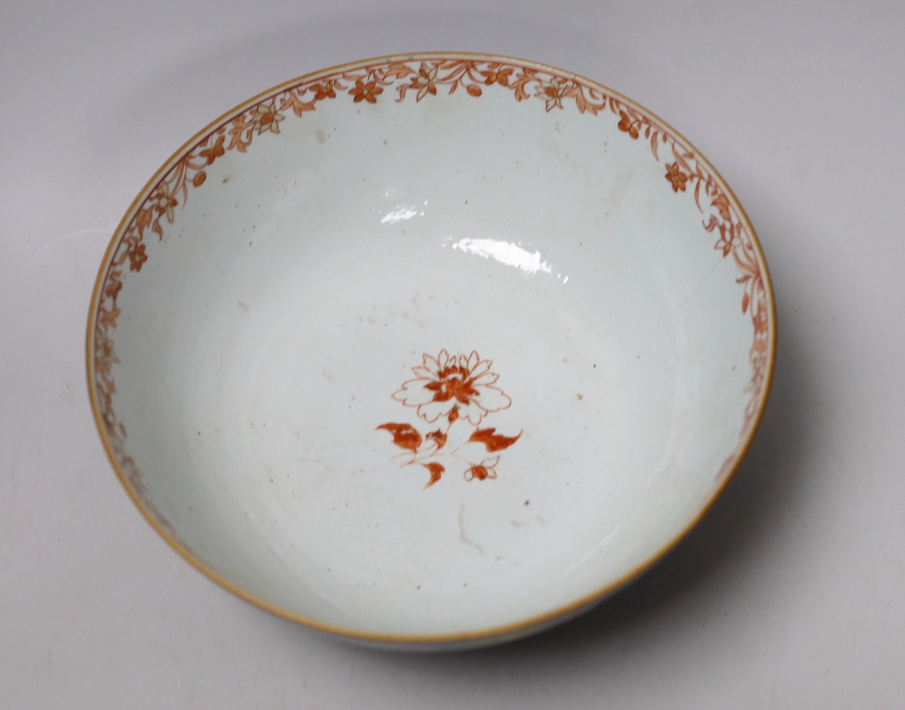 An 18th century Chinese gilt decorated powder blue glazed bowl, 26cm diameter